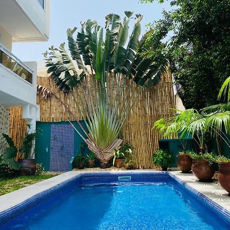 L'Oasis Guesthouse Котону Екстер'єр фото