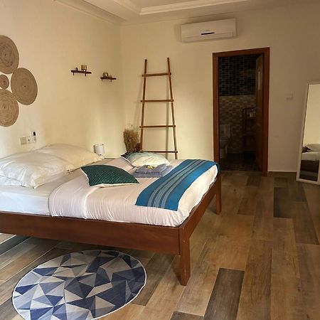 L'Oasis Guesthouse Котону Екстер'єр фото