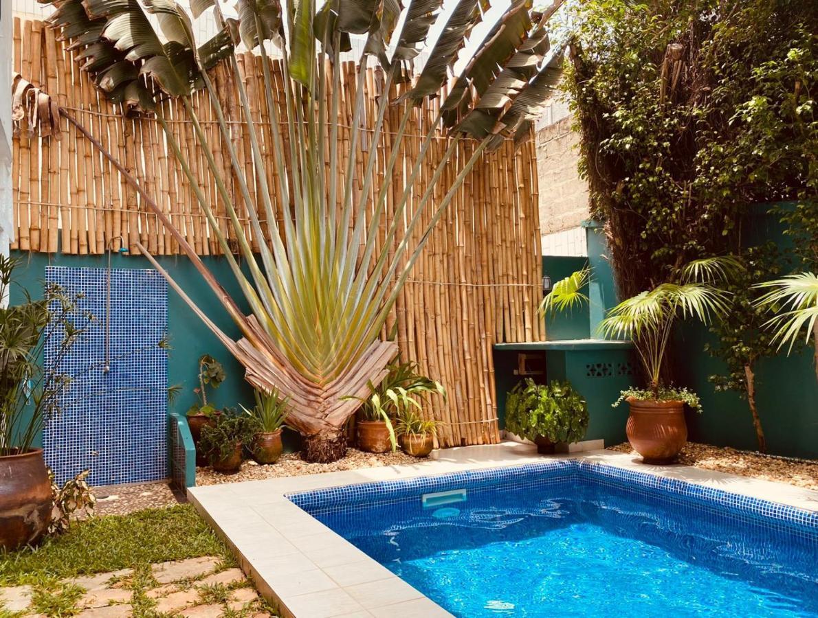 L'Oasis Guesthouse Котону Екстер'єр фото
