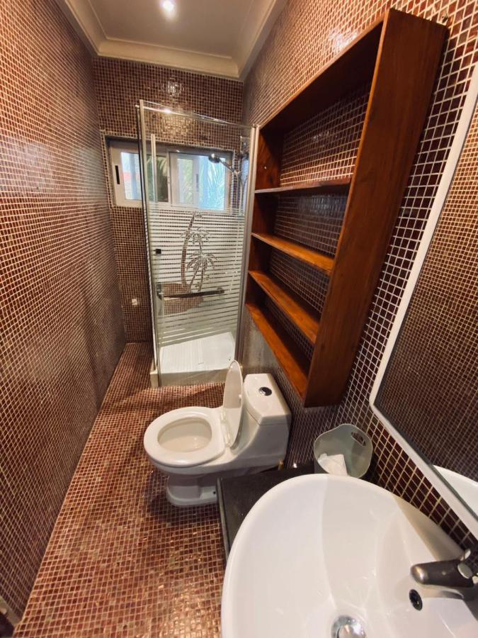L'Oasis Guesthouse Котону Екстер'єр фото