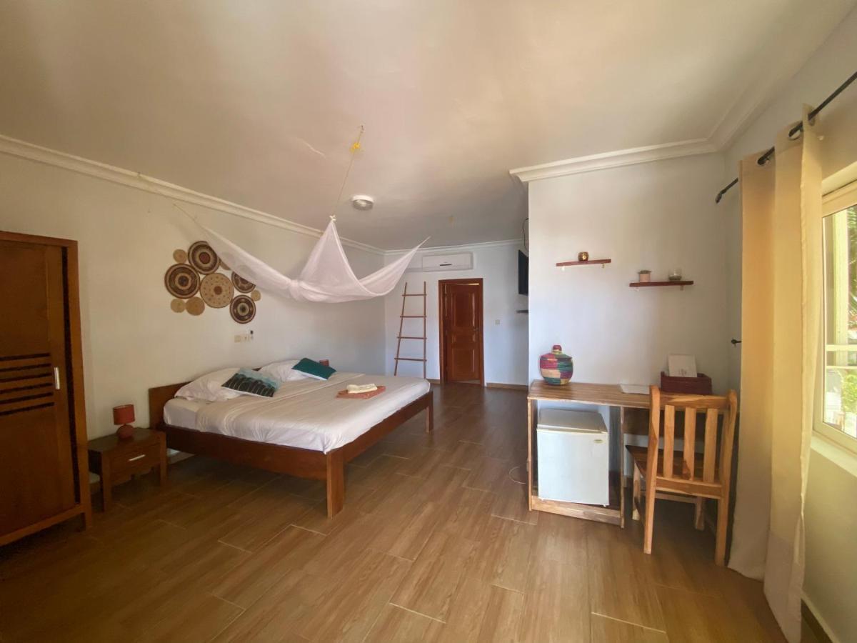 L'Oasis Guesthouse Котону Екстер'єр фото