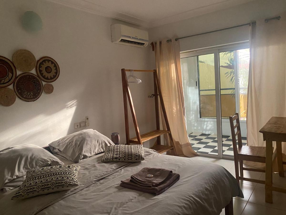 L'Oasis Guesthouse Котону Екстер'єр фото