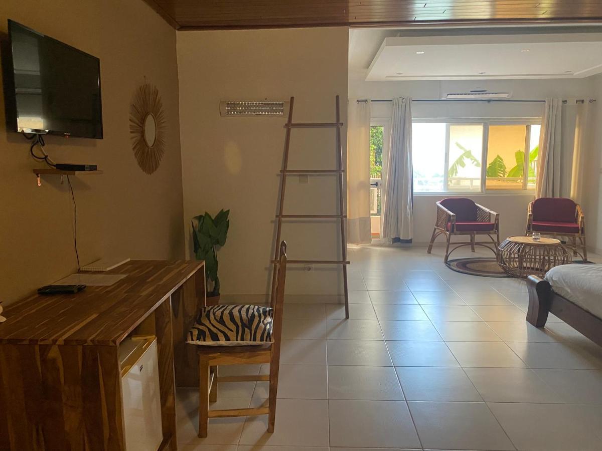 L'Oasis Guesthouse Котону Екстер'єр фото