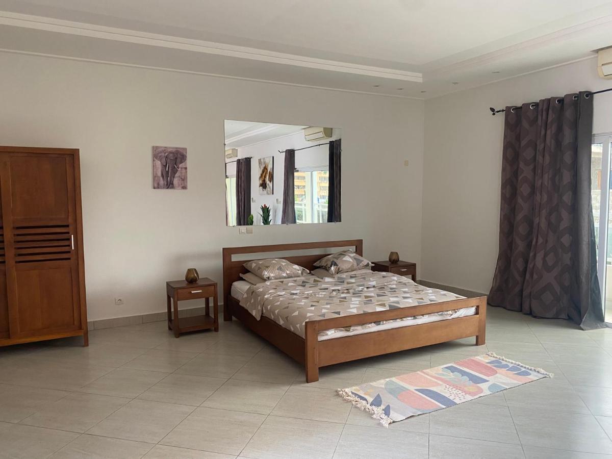 L'Oasis Guesthouse Котону Екстер'єр фото