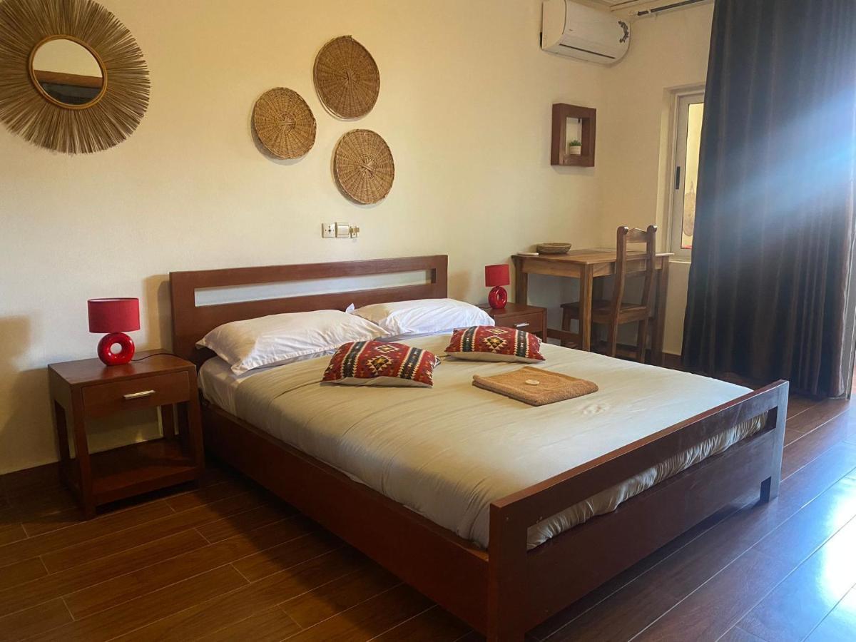L'Oasis Guesthouse Котону Екстер'єр фото