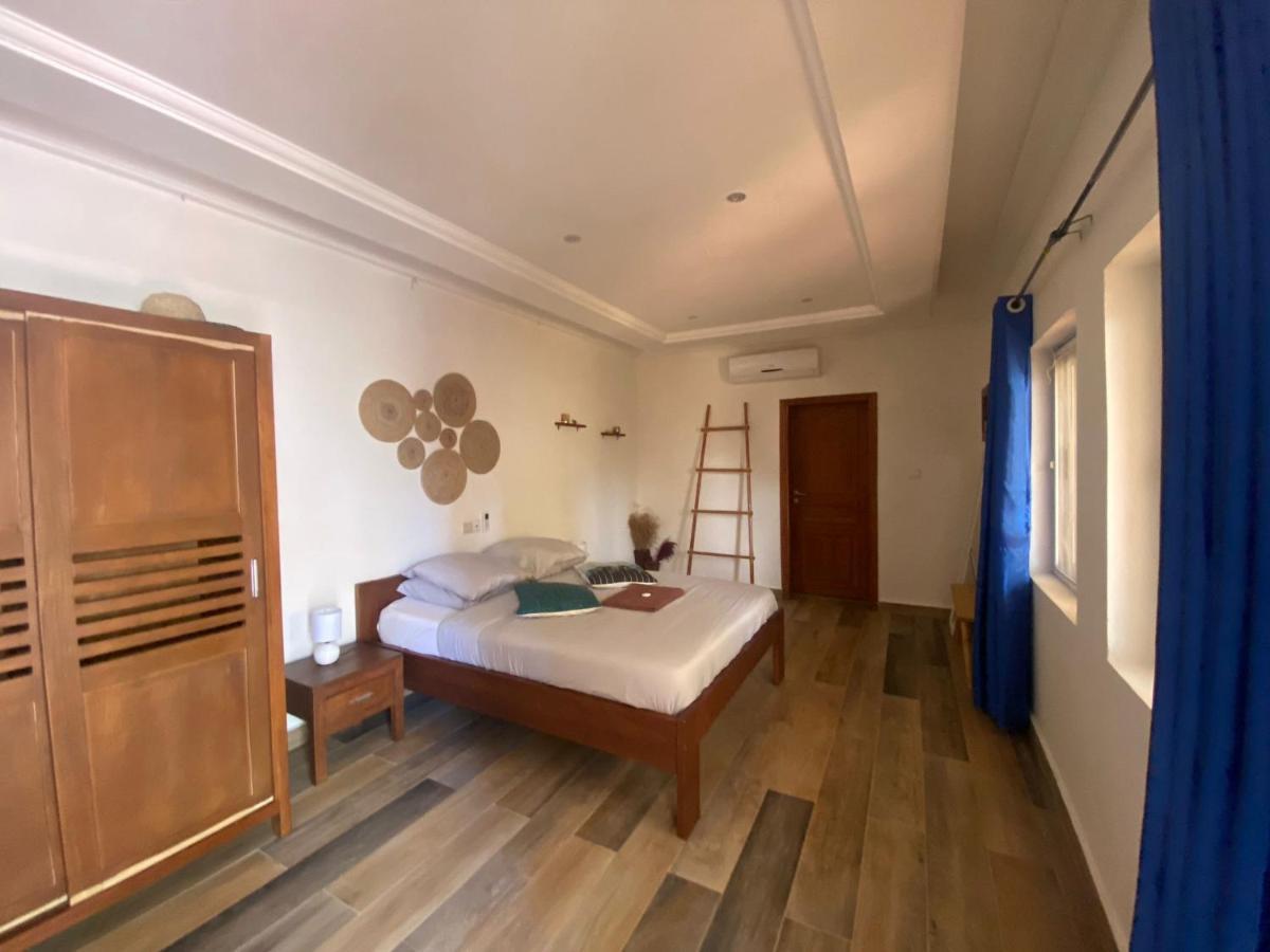 L'Oasis Guesthouse Котону Екстер'єр фото