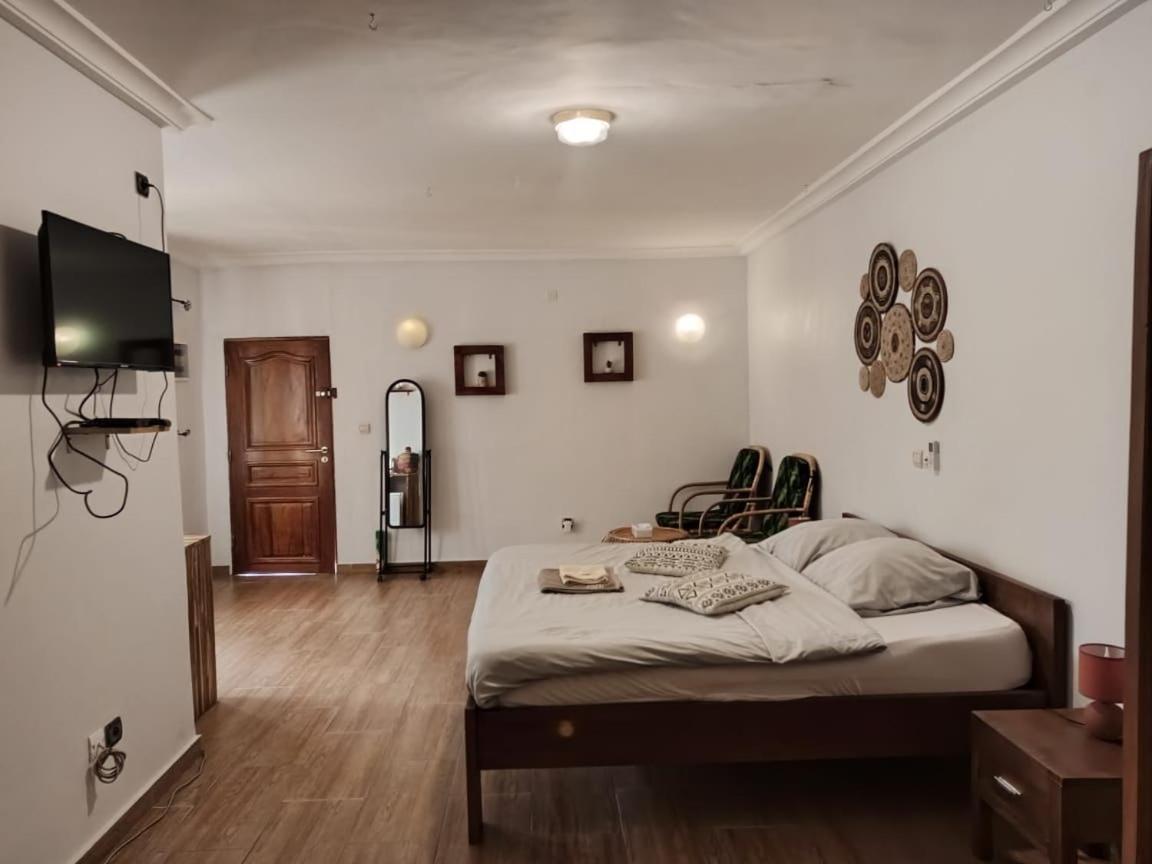 L'Oasis Guesthouse Котону Екстер'єр фото