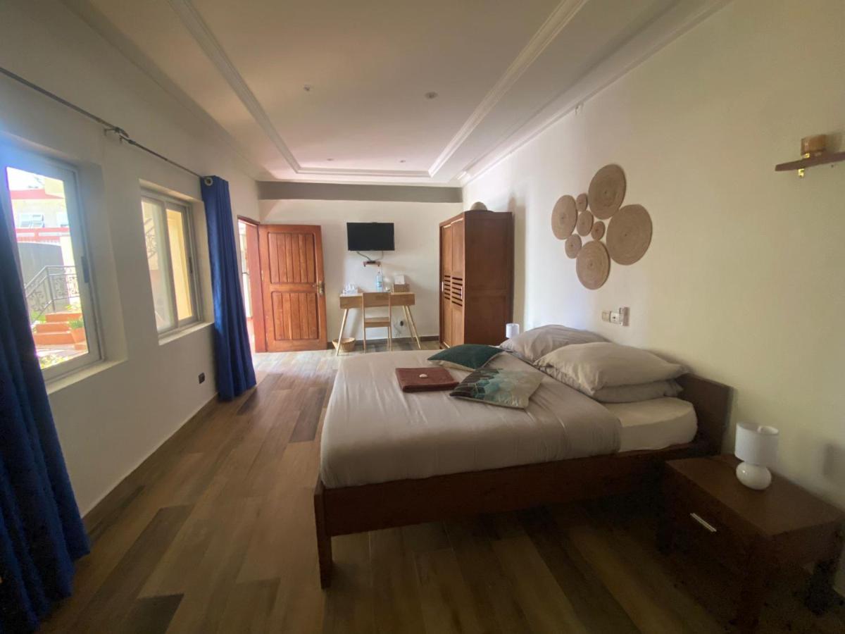 L'Oasis Guesthouse Котону Екстер'єр фото