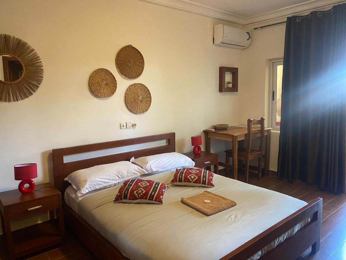 L'Oasis Guesthouse Котону Екстер'єр фото