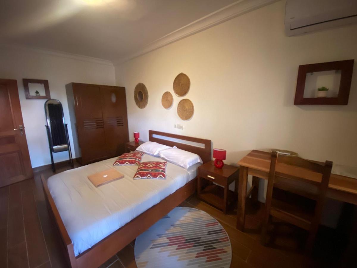 L'Oasis Guesthouse Котону Екстер'єр фото