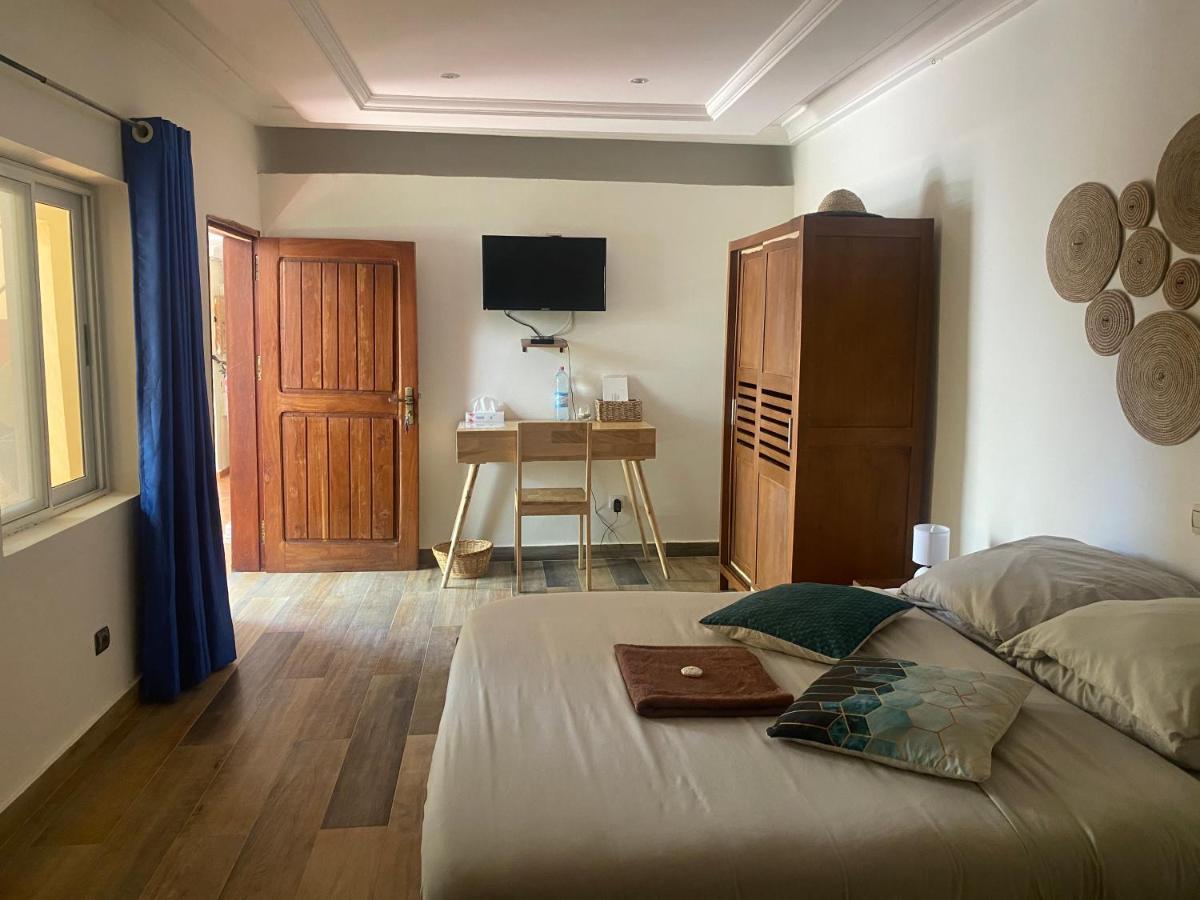L'Oasis Guesthouse Котону Екстер'єр фото