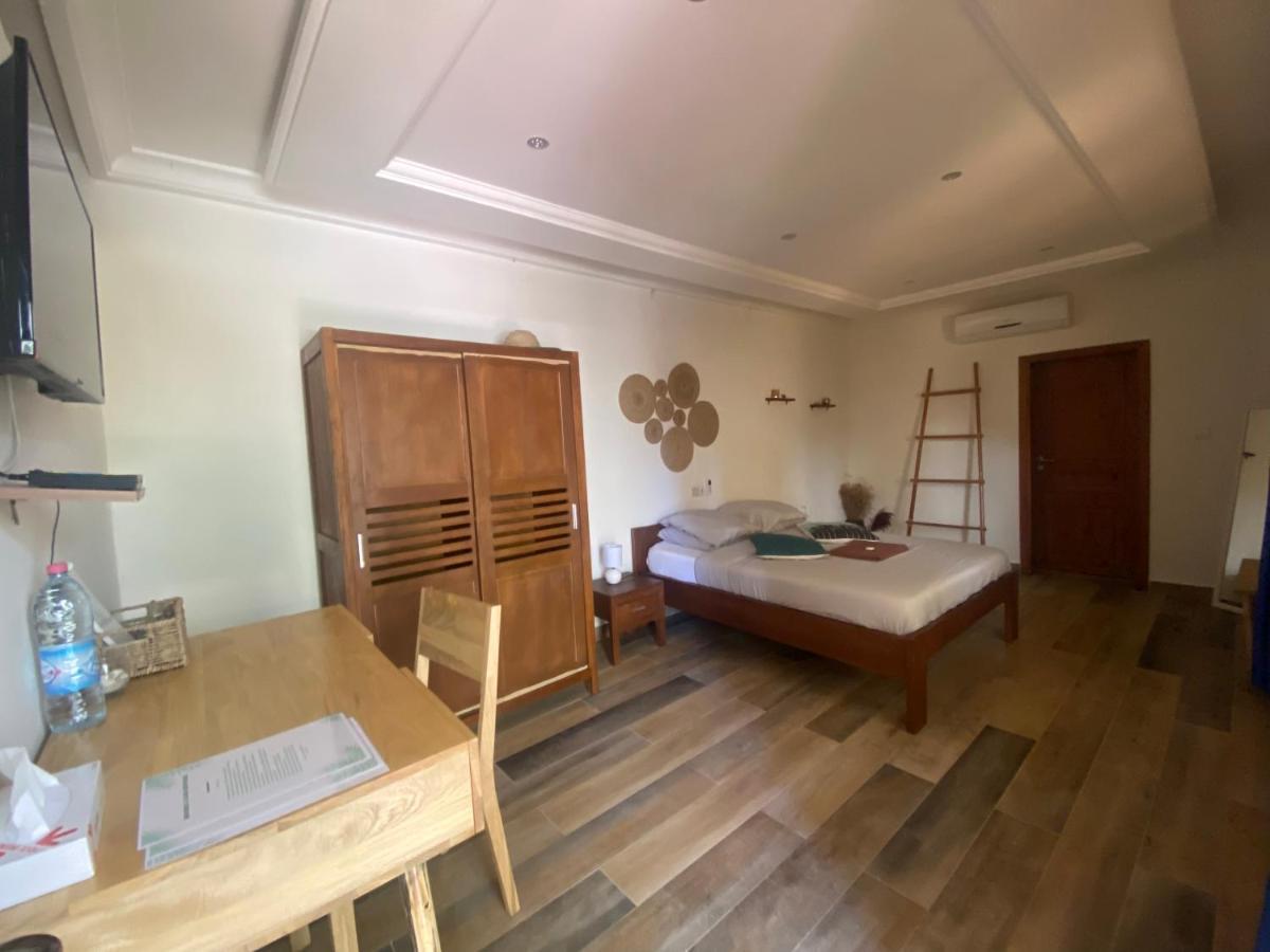 L'Oasis Guesthouse Котону Екстер'єр фото