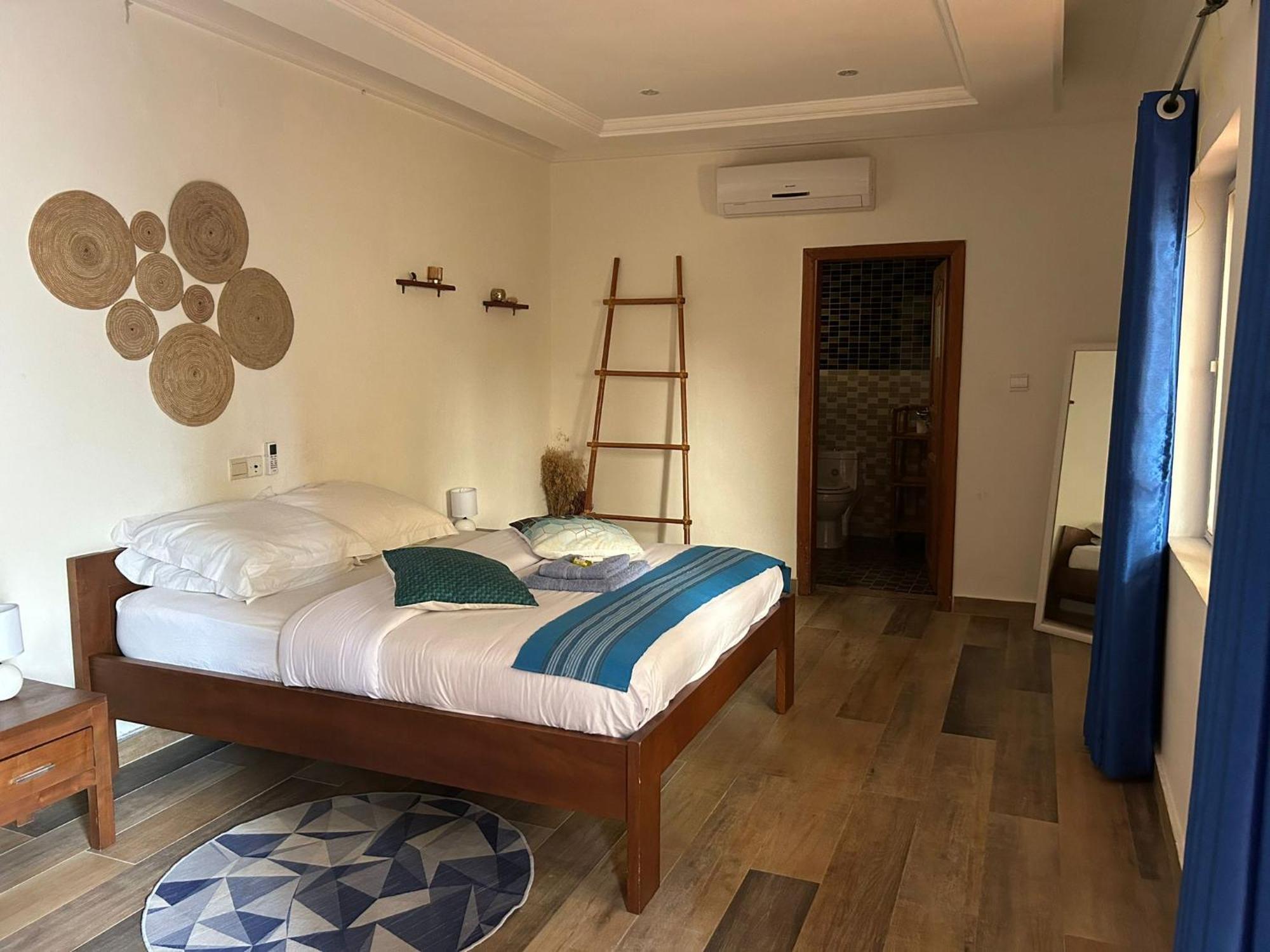 L'Oasis Guesthouse Котону Екстер'єр фото