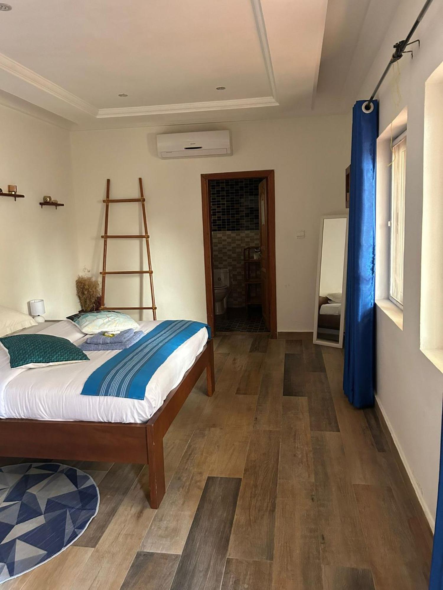 L'Oasis Guesthouse Котону Екстер'єр фото