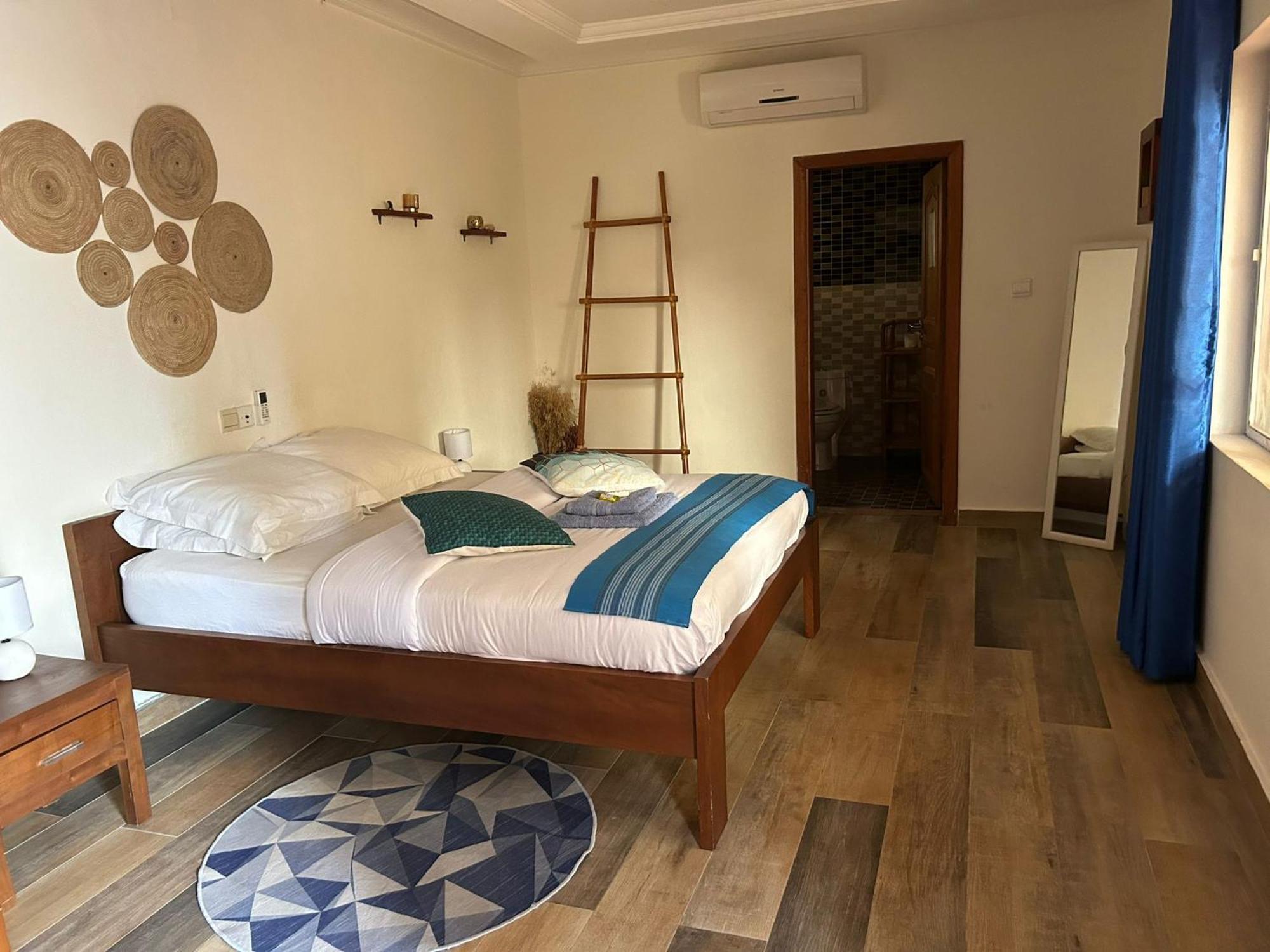 L'Oasis Guesthouse Котону Екстер'єр фото