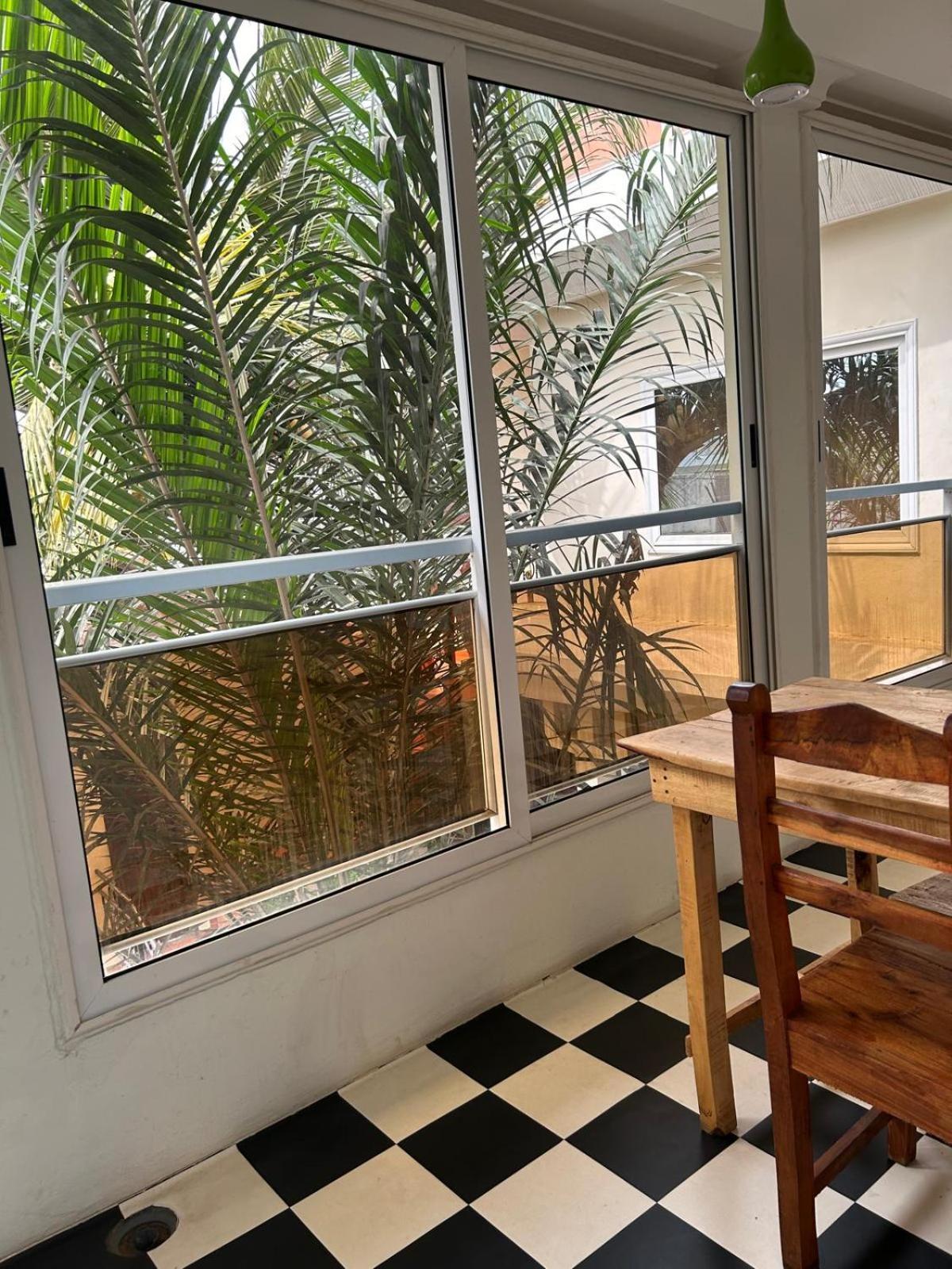 L'Oasis Guesthouse Котону Екстер'єр фото