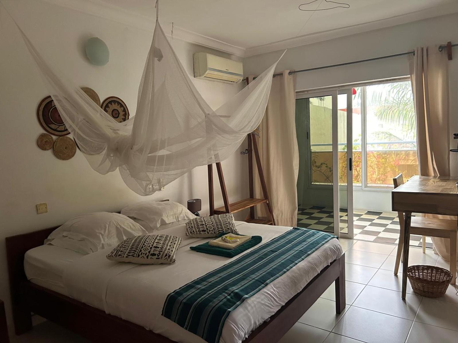 L'Oasis Guesthouse Котону Екстер'єр фото