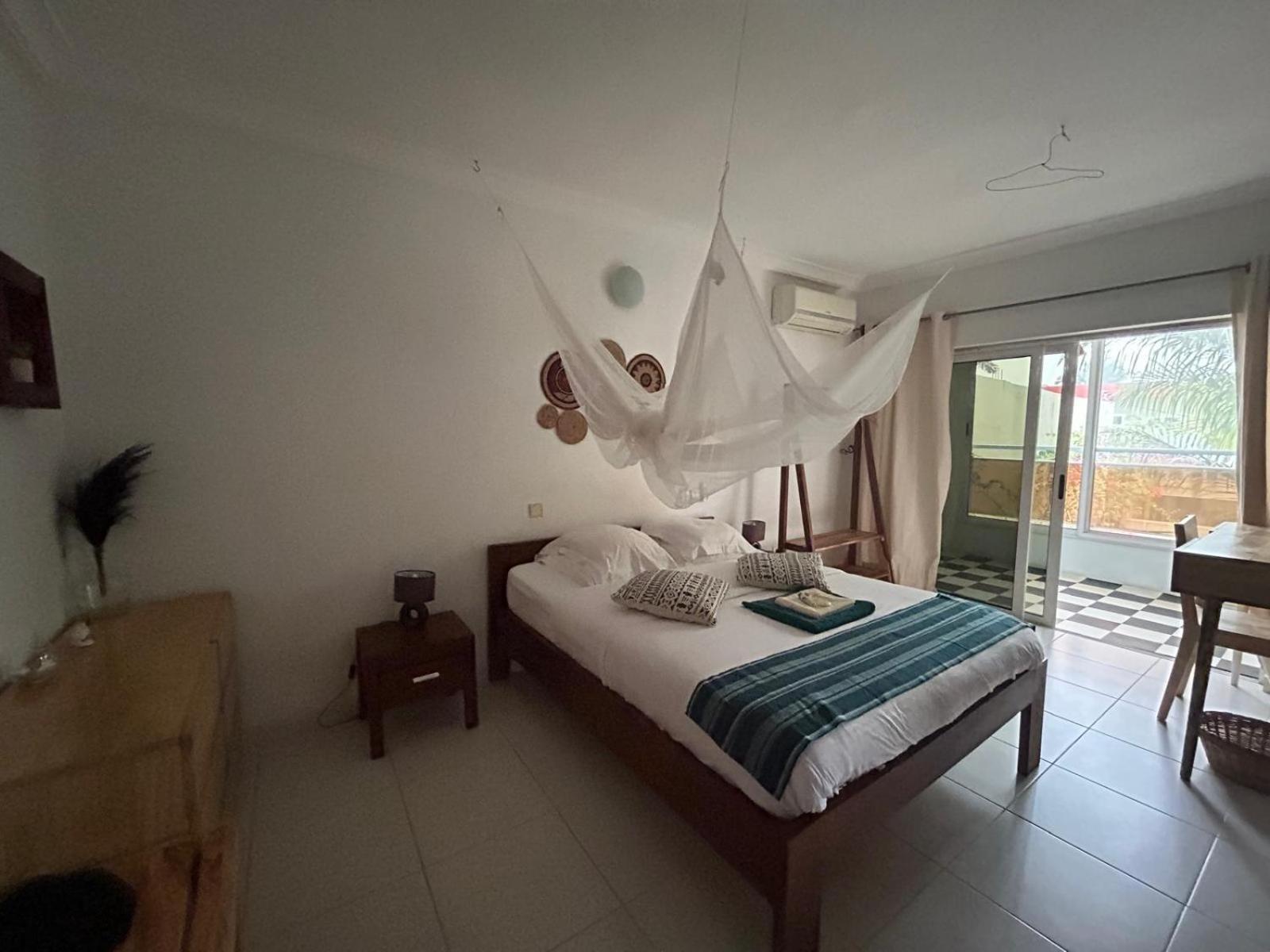 L'Oasis Guesthouse Котону Екстер'єр фото