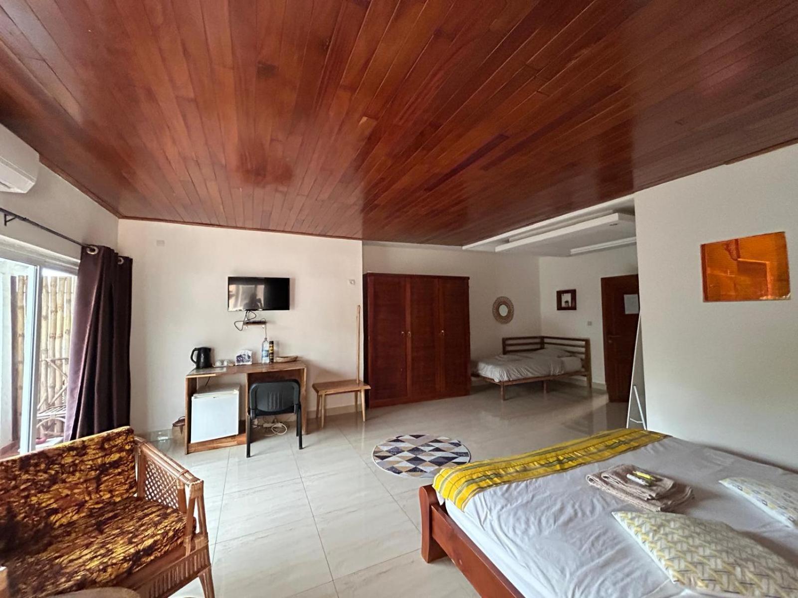 L'Oasis Guesthouse Котону Екстер'єр фото