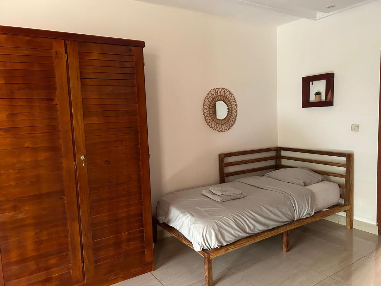 L'Oasis Guesthouse Котону Екстер'єр фото