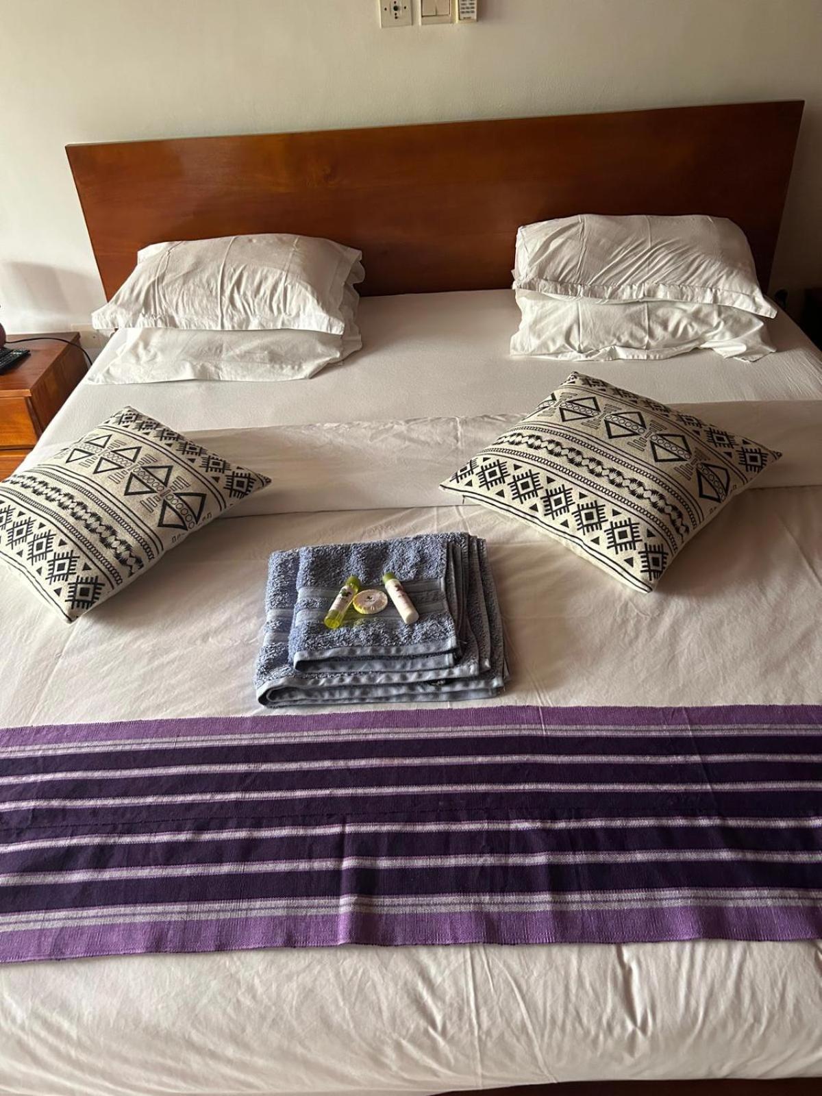 L'Oasis Guesthouse Котону Екстер'єр фото