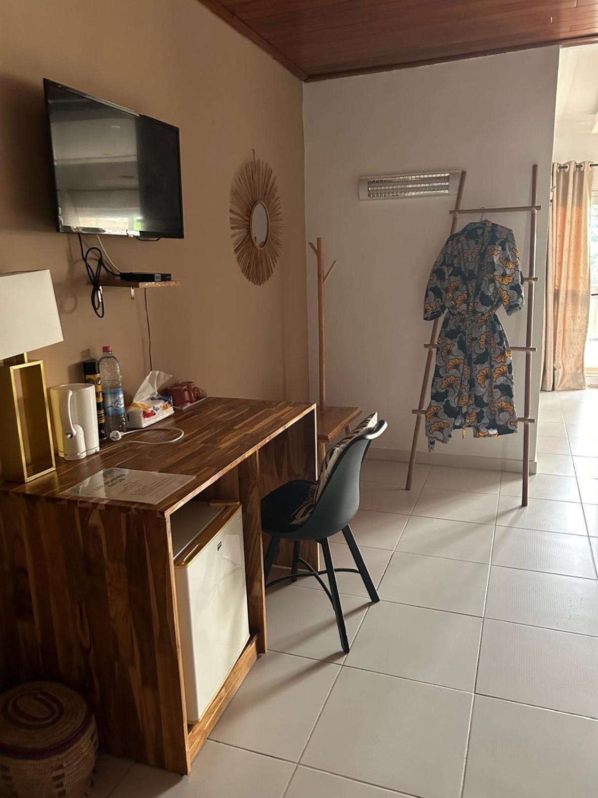 L'Oasis Guesthouse Котону Екстер'єр фото