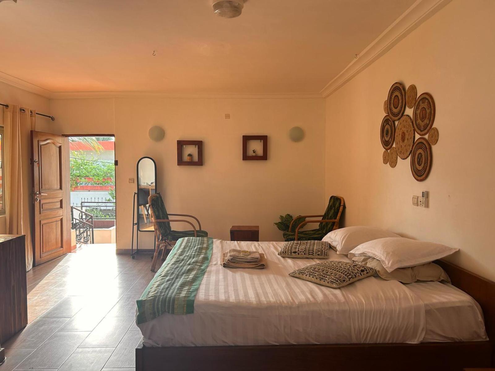 L'Oasis Guesthouse Котону Екстер'єр фото