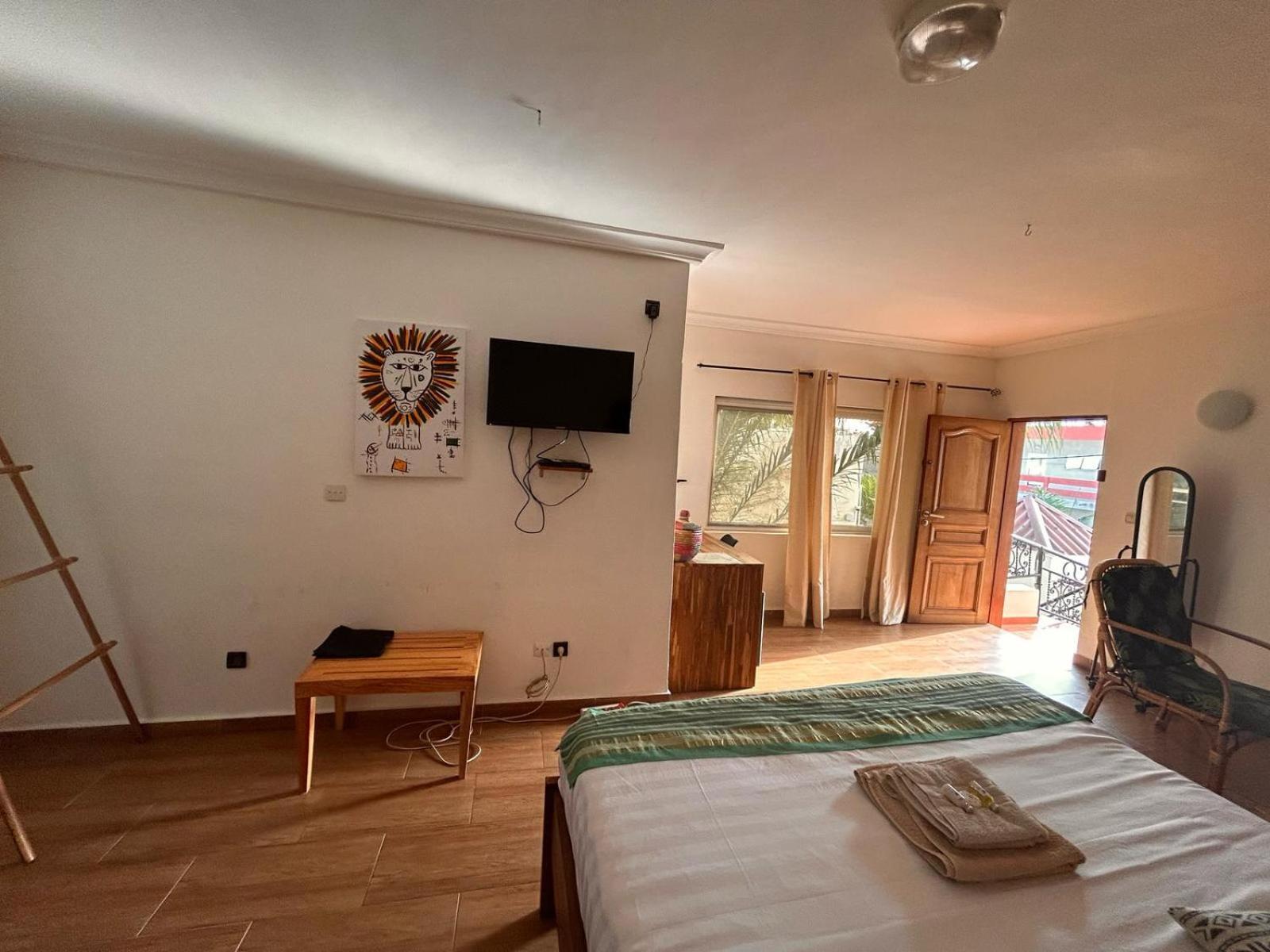 L'Oasis Guesthouse Котону Екстер'єр фото
