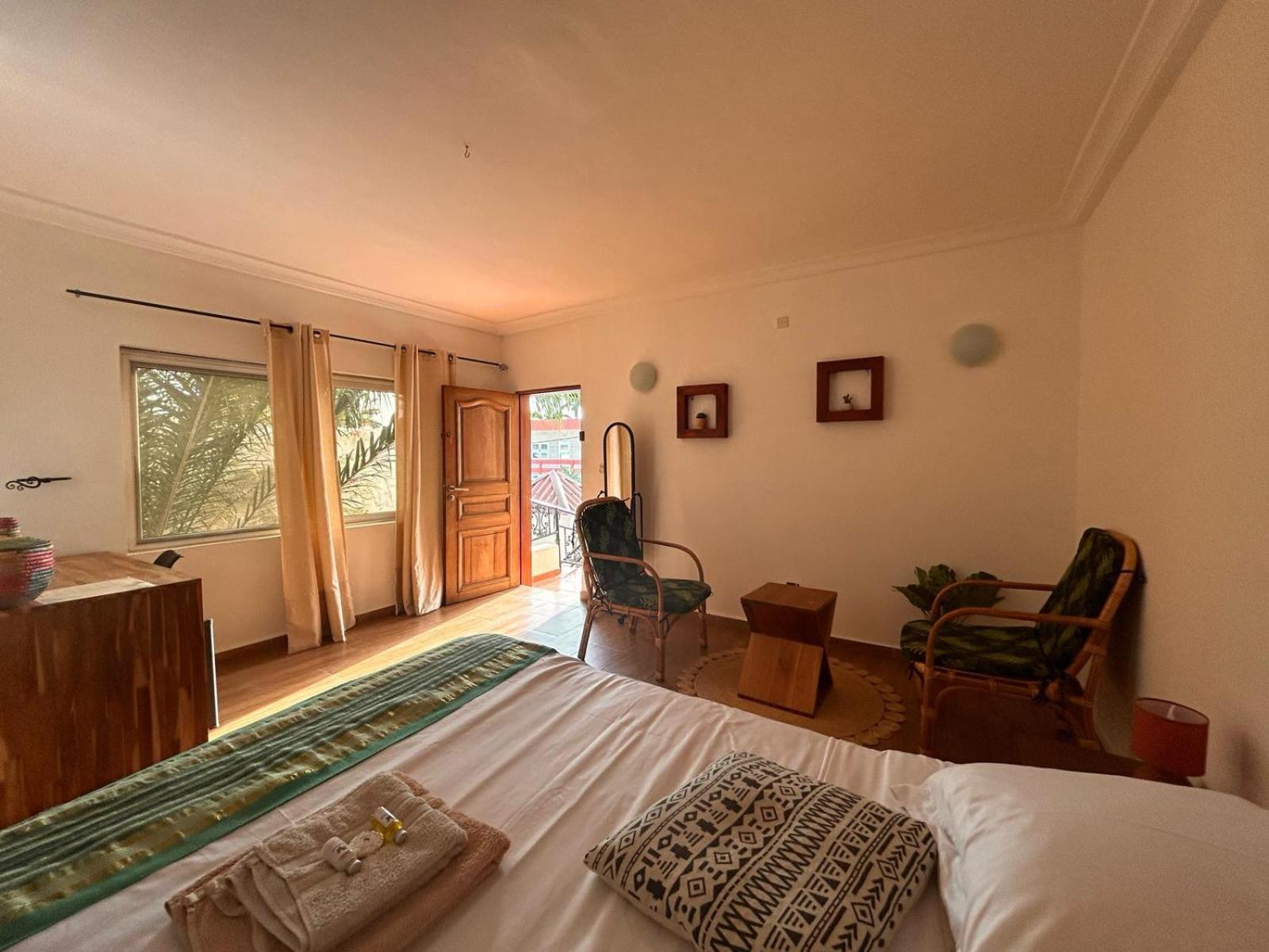 L'Oasis Guesthouse Котону Екстер'єр фото